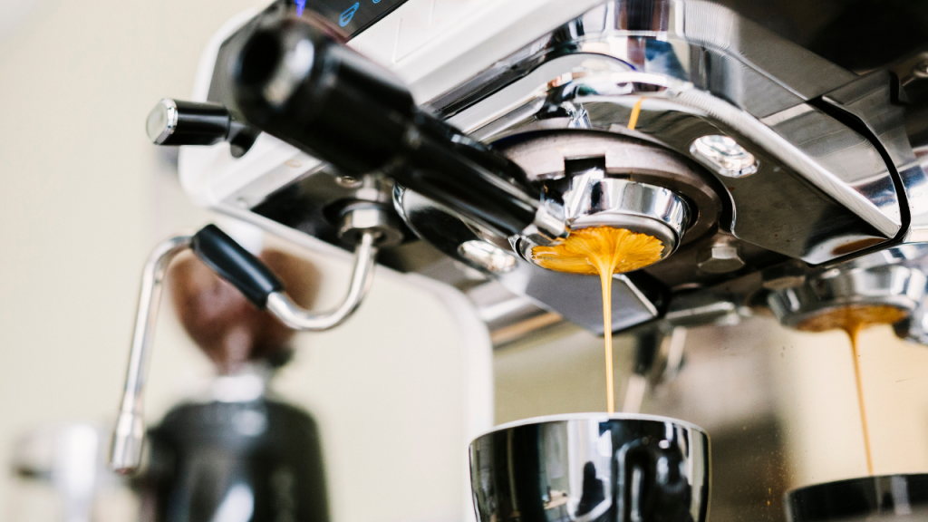 espresso coming out of a naked portafilter