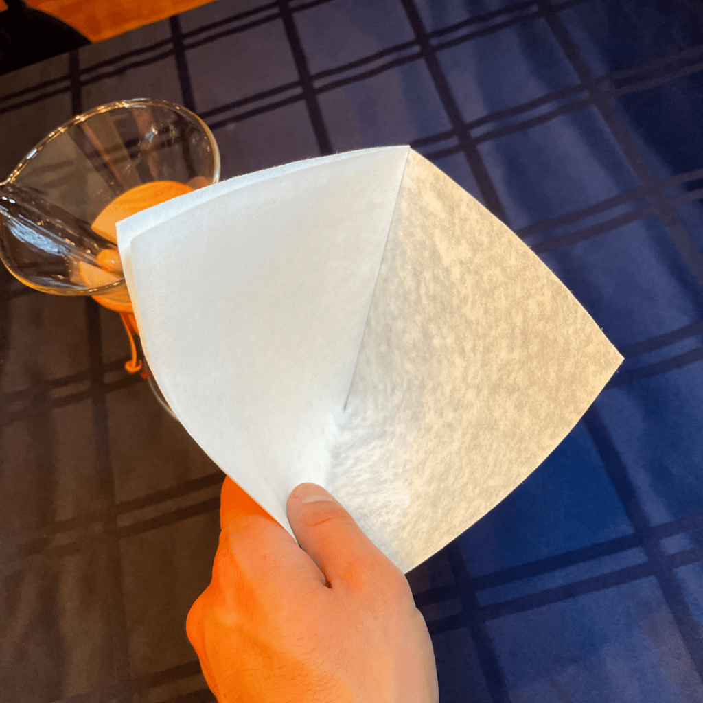 Filter placement for a Chemex: open filter with only one of four sheets.  Place the thicker side towards the spout of the Chemex.