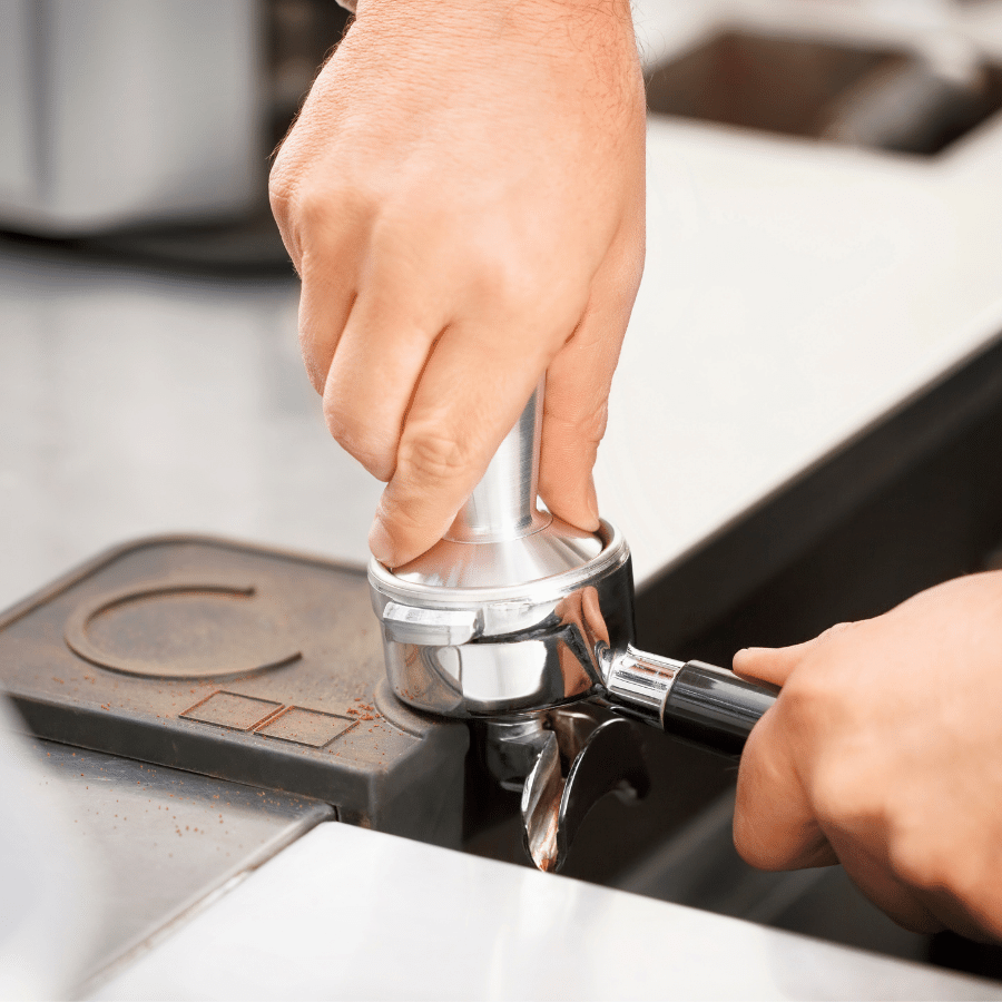 How to use an espresso machine tamping