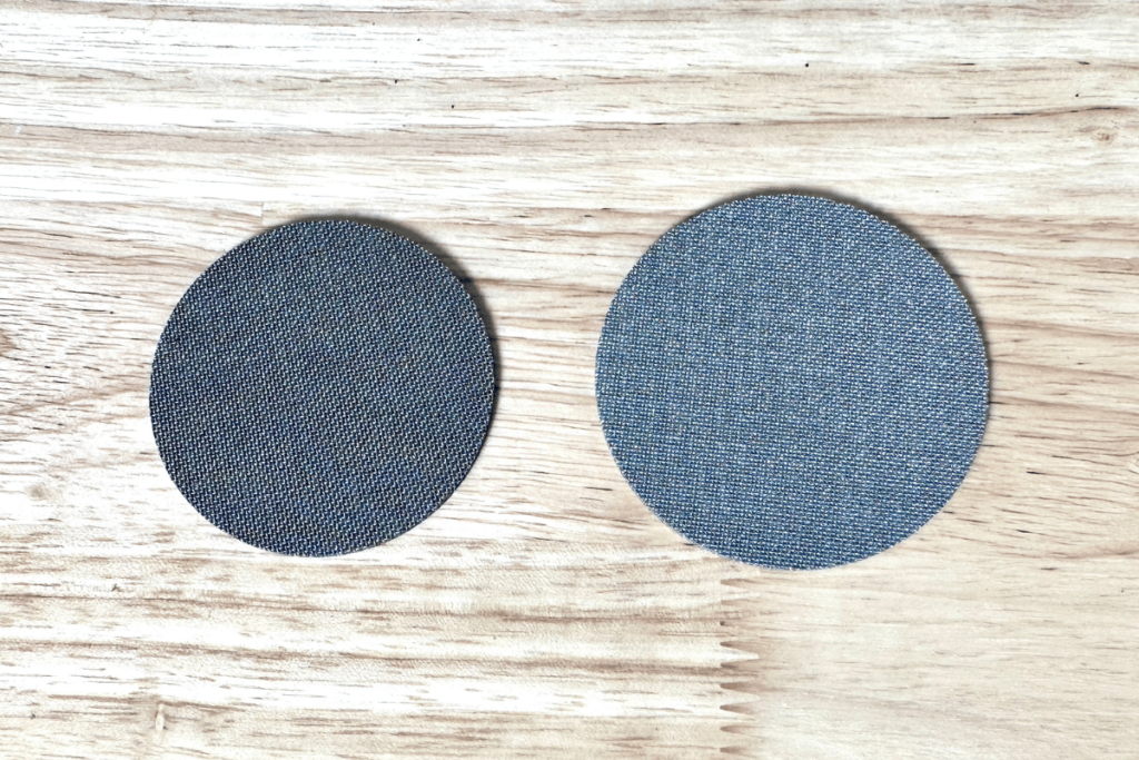 two espresso puck screens on a table