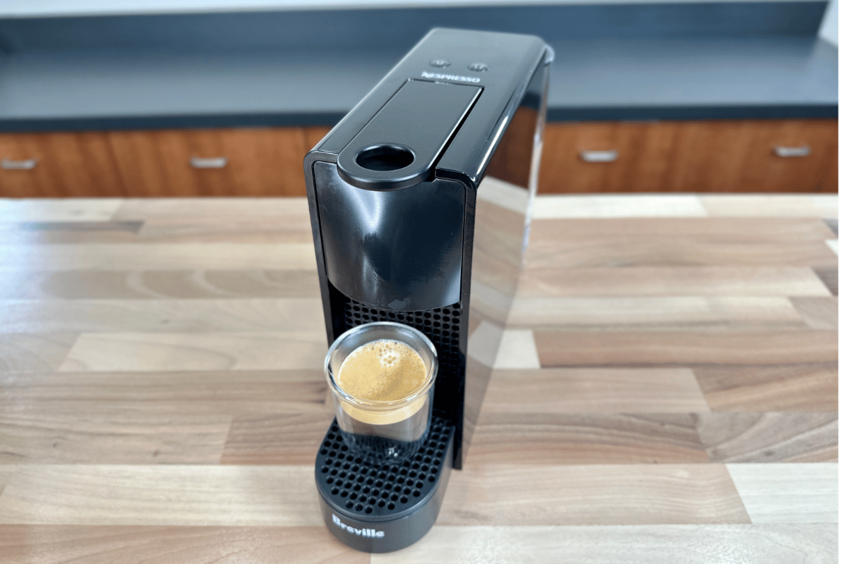 A Nespresso Essenza Mini brewing a coffee