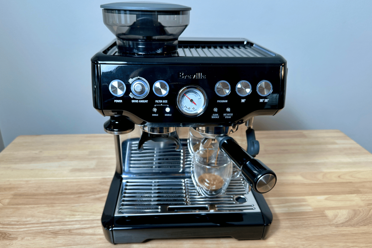 espresso flowing from a Breville Barista Express